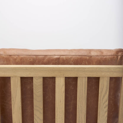 Raeleigh Faux Leather Accent Chair